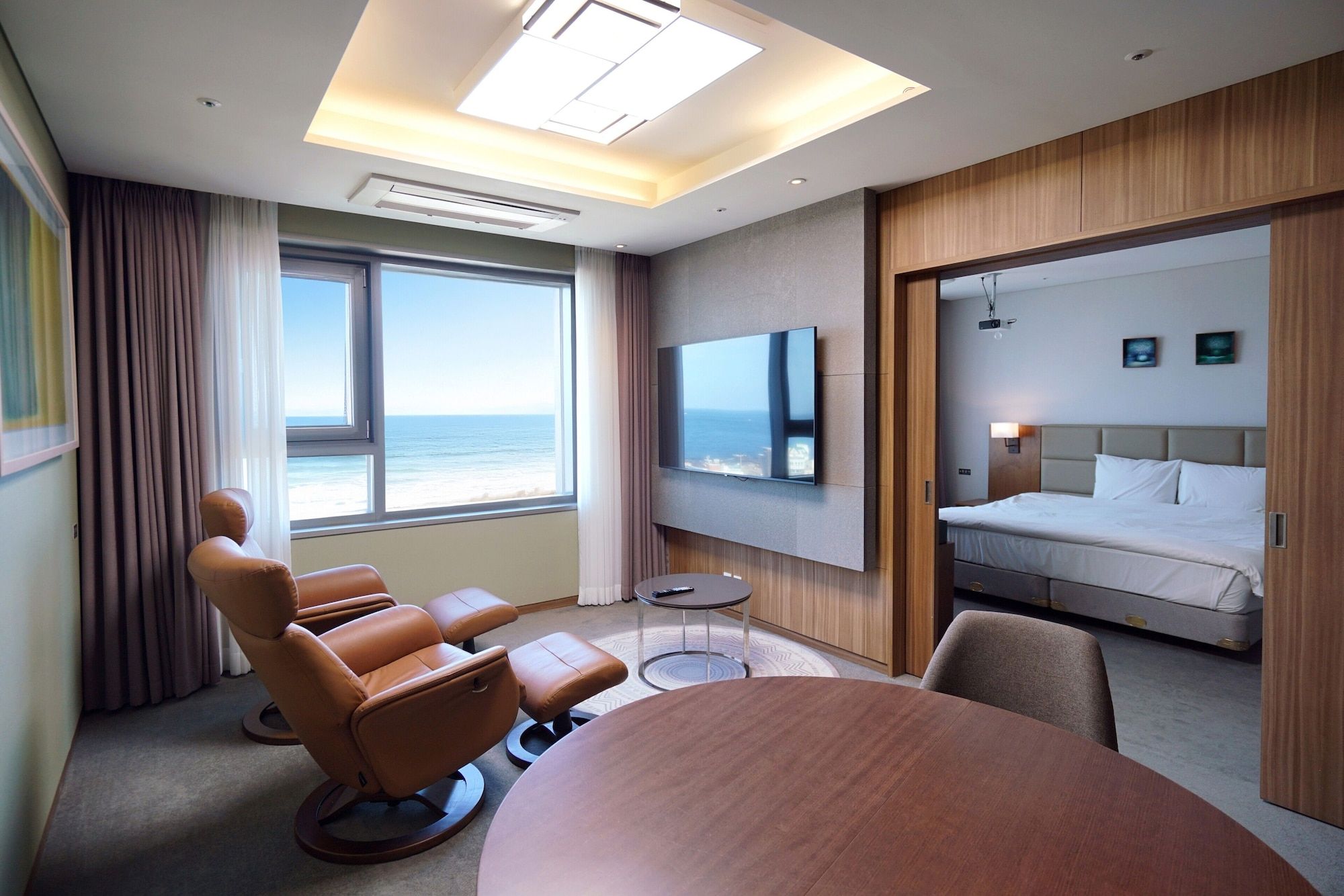 Real suite living room and ocean view at Grabel Hotel Jeju